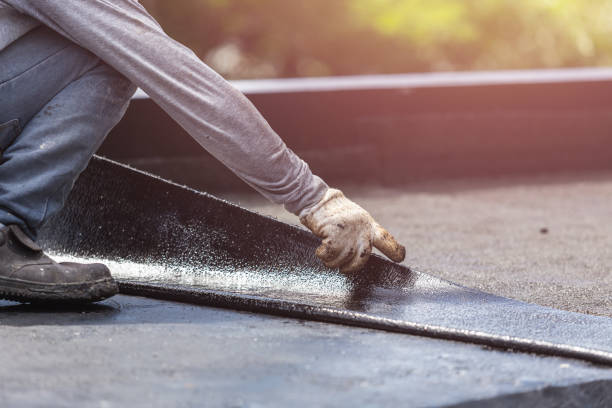 Professional Basement Waterproofing technician working in Akron, NY
